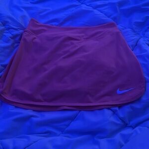 activewear bright neon coral skirt with built in shorts